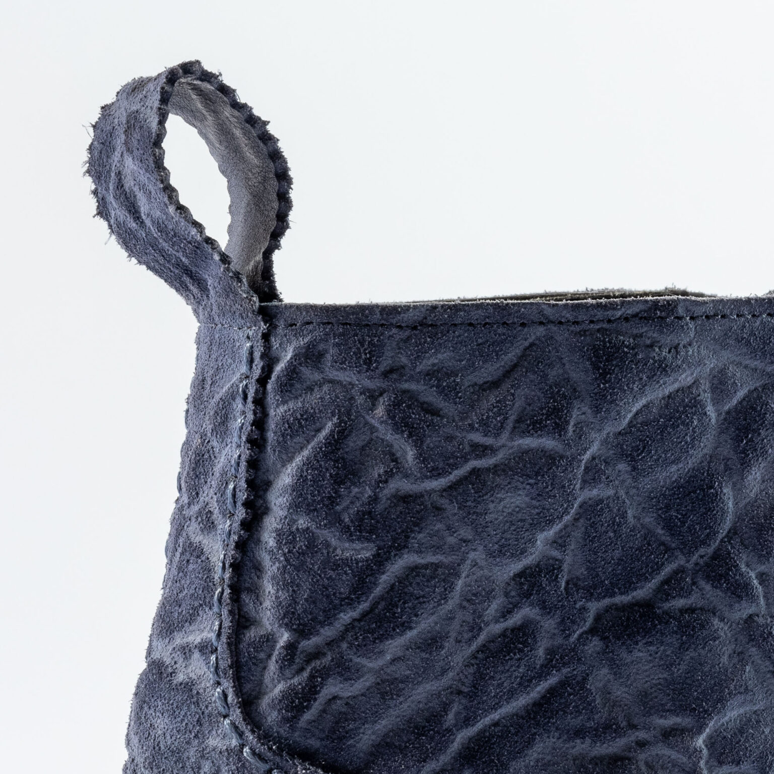 Closeup of ski hooks on Woburn Monkey Boot in Navy CF Stead Janus Calf with Edwin emboss